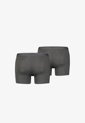 Grå boxershorts med glatt tekstur, design med korte ben og en kontrasterende midjebånd. Har ensfarge uten mønstre eller detaljer.