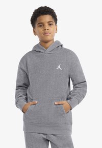 Gray hooded sweatshirt made of soft fabric, featuring a front pocket and a white Jumpman logo on the left chest.