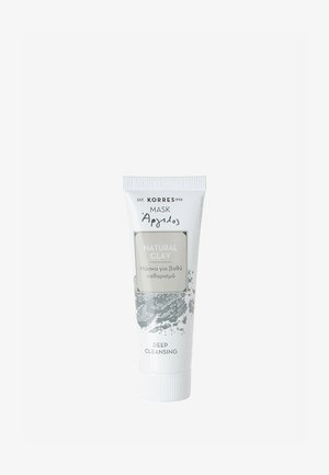 Natural clay mask in a white tube with gray accents. Features a label displaying "Natural Clay" and "Deep Cleansing" in clear typography.