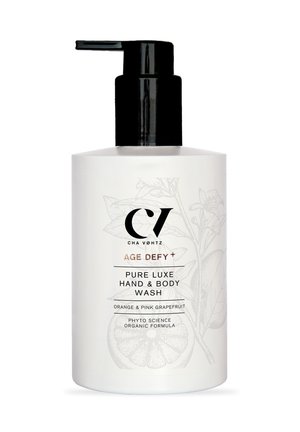Pumpflasche von Cha Vohtz Age Defy+ Pure Luxe Hand- und Körperwaschmittel mit Orange und pinkem Grapefruit-Duft, biologischer Formel.