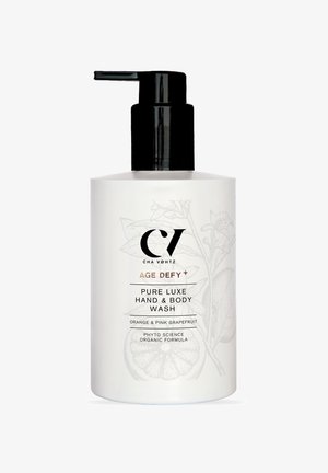 Pumpflasche von Cha Vohtz Age Defy+ Pure Luxe Hand- und Körperwaschmittel mit Orange und pinkem Grapefruit-Duft, biologischer Formel.