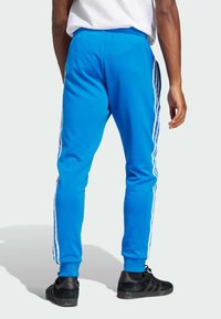 adidas Originals Treningo apatinė dalis - blue bird   white