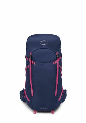 Sac à dos Osprey Sportlite 30 en bleu marine avec des accents roses, doté de bretelles réglables, d'un sommet arrondi et de plusieurs compartiments.