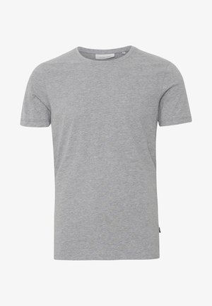 T-shirt en coton gris à manches courtes, col rond et coupe régulière. Présente une petite étiquette de marque sur le bas à gauche.