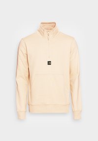 Felpa pesco light con colletto a zip a quarto, polsini a coste, tasca frontale e una piccola etichetta con logo sul petto. Tessuto morbido in misto cotone.