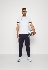JAKO ALLROUND - Jogginghose - marine/neongelb