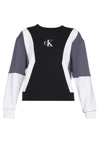 Sudadera con bloque de color negro, blanco y gris, con cuello redondo, mangas largas y un pequeño logo "CK" en el frente. Textura de tela suave.