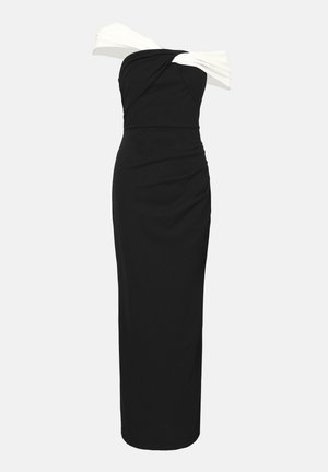 Õlavarrelt avatud must kleit valgete aktsentidega, kehasse sobiv disain, tekstuuriga kangas ja põrandani ulatuv siluett. Omab kogutud detaile.