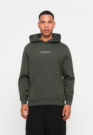 Green hooded sweatshirt with kangaroo pocket, featuring front text “WEEKEND OFFENDER ADMIT NOTHING” in white. Made of soft, thicker fabric.