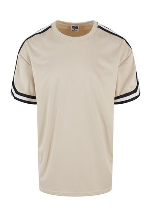 Beige mesh t-shirt med svart och vit randig kant på ärmarna. Har en rund halsringning och en lös passform för komfort.