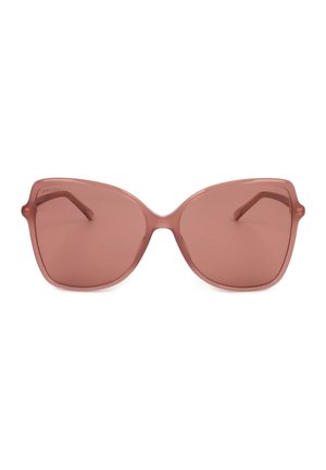 Occhiali da sole quadrati oversize con bordi arrotondati in montatura rosa tenue traslucida e lenti colorate abbinate.