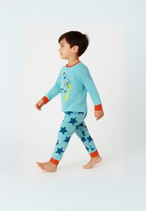 Turquoise pajama set featuring a rocket graphic on the top, complemented by navy star patterns on the pants and orange cuffs.