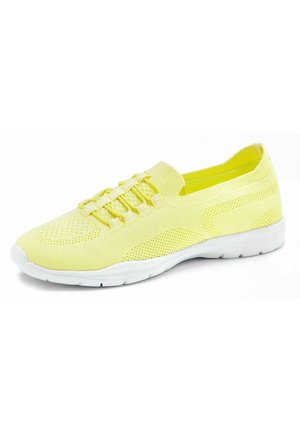 Yellow athletic shoe with a breathable mesh upper, elastic laces, and a white rubber sole. Textured detail on the upper for enhanced grip.