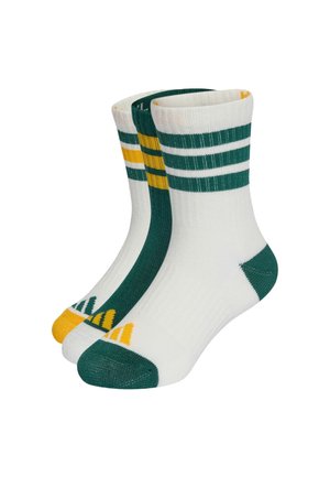 Trois paires de chaussettes basses avec base blanche, orteils et talons verts, et des rayures vertes et jaunes variées sur les chevilles et la zone du pied.