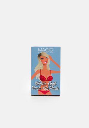 Red packaging for water-soft push-up pads, features an illustrated figure in a red bra, text prominently displayed on a blue background.