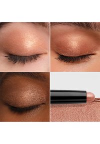 Creme-Lidschatten in warmem Kupferton, mit geschmeidiger Textur. Verfügt über eine Drehhülse mit abgerundeter Spitze, die in verschiedenen Winkeln auf die Augenlider aufgetragen wird.