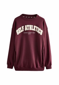 Burgundia sviiter valgete kumerate "SELF ATHLETICS" tekstiga; pehme kangas, ribiga kaelus ja mansetid, mugav lõige ning langevad õmblused õlgadel.