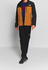 The North Face Softshellová bunda - brown
