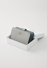 Gray leather wallet with a textured finish, presented in a white box. Features gold hardware and a blue interior accent.