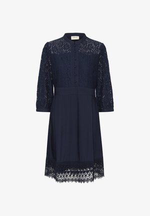 Mornarsko modra obleka s tremi četrtinami čipkastih rokavov, golim ovratnikom, sprednjim gumbom in zapletenim čipkastim obrobom na robu. Tkanina je gladka.