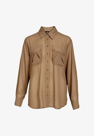 Long-sleeve tan button-up shirt with pointed collar and two buttoned chest pockets, displayed on a white background.