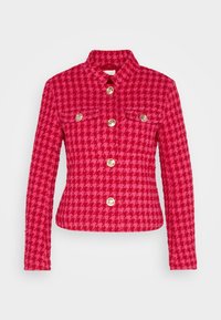 Giacca a quadri houndstooth rosa con colletto, due tasche frontali e bottoni dorati, realizzata in tessuto testurizzato. Design aderente.