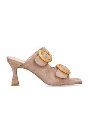 Mules de ante beige con tacón, con dos apliques texturizados superpuestos y acentos circulares amarillos. Diseño de punta abierta con un tacón de altura media.