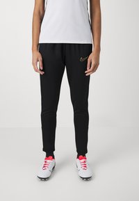 Nike Performance ACADEMY PANTS - Treningo apatinė dalis - black/metallic gold