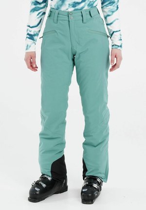 Mintgroene, waterdichte skibroeken met een slim fit ontwerp, ritszakken aan de zijkant en zwarte accenten aan de onderkant. Glad materiaal, geschikt voor skiën.