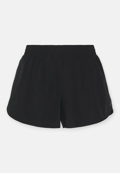 Svarte shorts laget av lett materiale, med elastisk linning og avrundet nederkant. Rent design uten synlige mønstre eller grafikk.