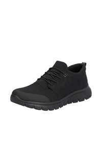 Basket athlétique noire avec bout en mesh, semelle épaisse rembourrée, fermeture à lacets et col rembourré, conçue pour un usage décontracté et sportif.