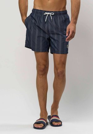Mørkeblå mønstrede badebukser med elastisk talje og hvid snor, der har sidelommer og et logopræget design.