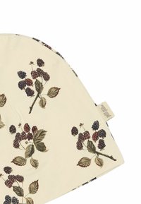 Cappello da cucina in cotone con sfondo crema e motivi di bacche e foglie in viola scuro e verde. Etichetta sul lato.