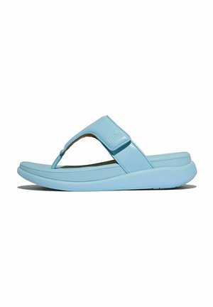 Blue flip-flop sandal with a soft, smooth texture, padded strap, and a cushioned sole. Features a slight curve in design and logo detail.