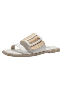 White sandals with a textured, woven beige strap, featuring two prominent buckle accents and a flat sole. Made of synthetic materials.