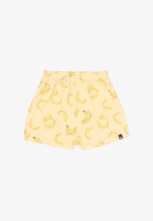 Shorts à taille élastique jaune avec un motif intégral de bananes entières et pelées sur un fond jaune clair.