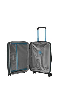 Valigia nera con accenti azzurri, guscio rigido e manico retrattile. L'interno presenta tasche in rete e cinghie per fissare gli oggetti.