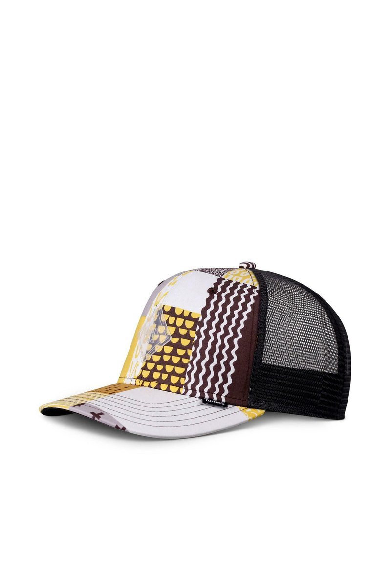 Trucker cap with a multicolored fabric front featuring geometric patterns in yellow, brown, and white; black mesh back; curved brim.