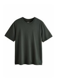 Camiseta de manga corta en verde oscuro hecha de algodón. Cuello redondo con una textura suave y corte recto. Diseño minimalista, sin patrones ni acentos.
