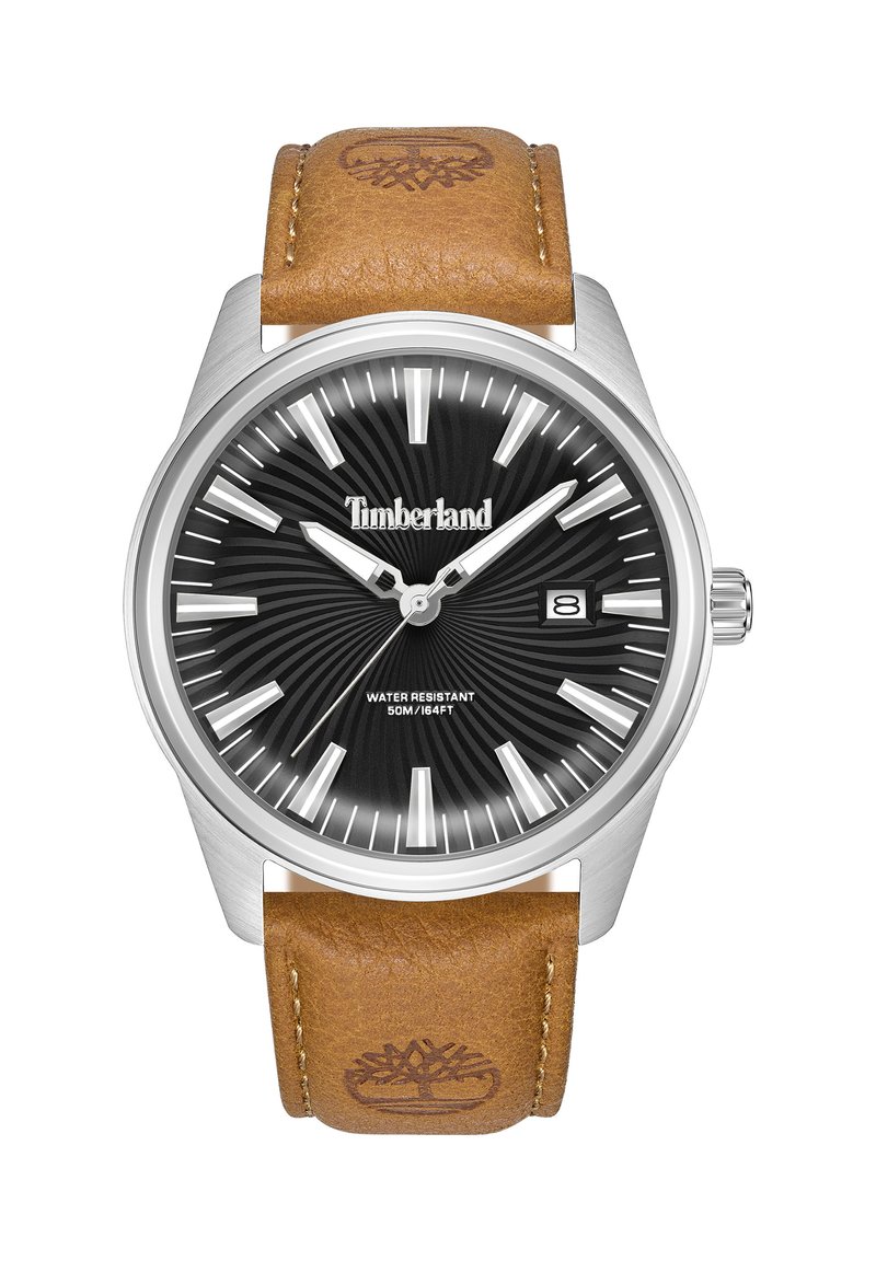 Timberland pulkstenis ar nerūsējošā tērauda korpusu, melnu saules staru ciparnīcu, baltām stundu atzīmēm un brūnu ādas siksniņu ar logo iedzīšanu. Ūdensizturīgs līdz 50m.