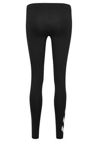 Schwarze Leggings mit einem figurbetonten Design, elastischem Bund und einem weißen Logo-Detail nahe dem linken Unterschenkel. Hergestellt aus glattem, dehnbarem Material.