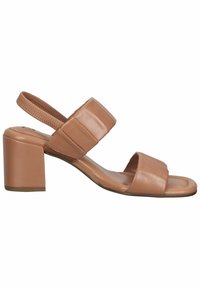 Sandale ouverte en cuir marron clair avec talon carré, larges brides rembourrées et bride arrière élastique pour un maintien sûr.