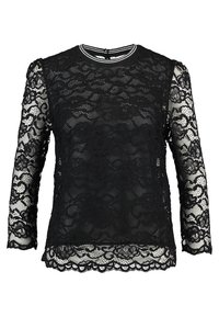 Top lungo in pizzo nero con maniche lunghe, caratterizzato da intricate fantasie floreali, un collo rotondo con bordo a righe e un orlo ondulato nella parte inferiore.
