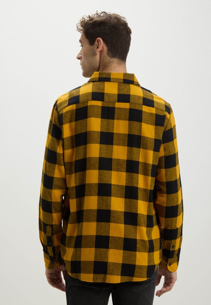 Camicia in flanella di cotone a quadri: unisex con bottoni