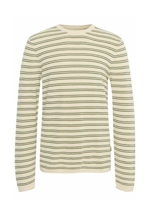 Camisa de manga larga color crema con rayas horizontales verdes. Cuello redondo y textura suave, con un sutil patrón en zigzag en las rayas.