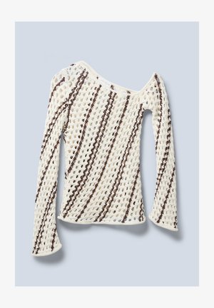 Crochet sweater in off-white with brown diagonal stripes, featuring an open knit design and long sleeves. Curved neckline and soft texture.