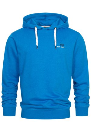 Kék pulóver kapucnis felső, puha pamutból készült. Húzózsinórral ellátott kapucnival, bordázott mandzsettával és derékkal. A mellkasán a "Est. 1993" feliratú logó található.