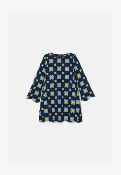 Granatowa sukienka z długimi falbaniastymi rękawami. Posiada kwiatowy wzór z niebieskimi i żółtymi kwiatami, wykonana z lekkiego materiału.