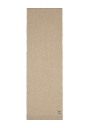 Bufanda de punto beige confeccionada en una tela suave. Presenta un pequeño parche con el logo y un borde texturizado ligeramente más grueso. Forma rectangular y larga.