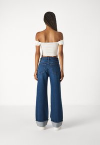 Abercrombie & Fitch HEM 90S  RELAXED  - Jean boyfriend - dark blue denim
